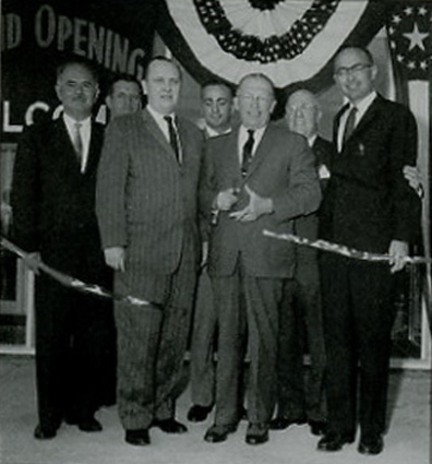 Opening the Cinema Shoppers World, Framingham in 1951 are Phil Smith, Dick Smith, and representatives of the shopping center developer, National Suburban Centers.